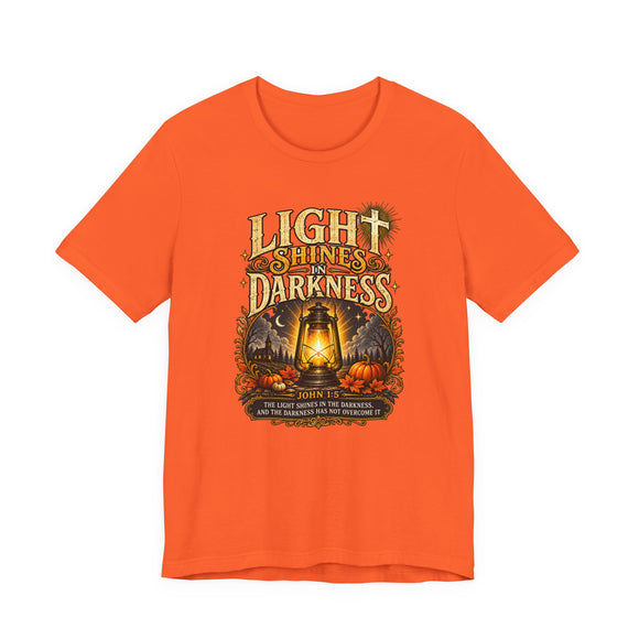 Light Shines in Darkness Tee — Christian Lantern Pumpkin Fall Halloween Shirt