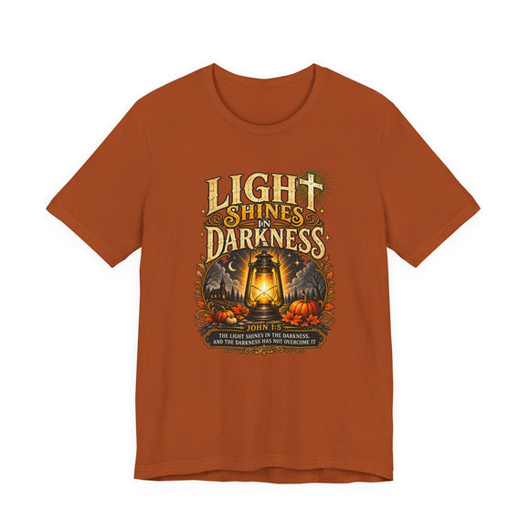 Light Shines in Darkness Tee — Christian Lantern Pumpkin Fall Halloween Shirt