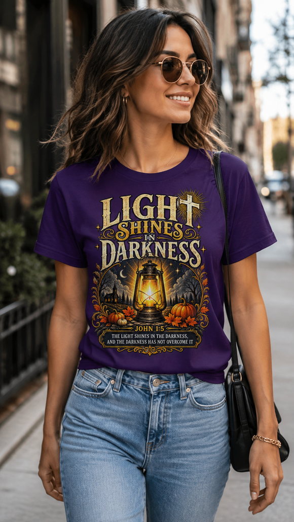 Light Shines in Darkness Tee — Christian Lantern Pumpkin Fall Halloween Shirt