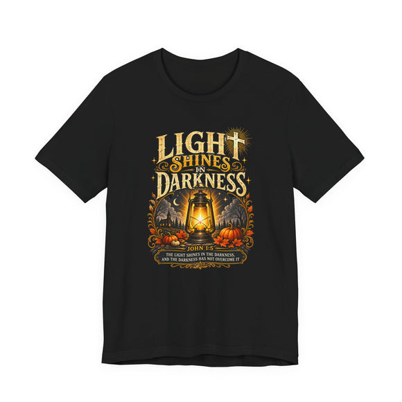 Light Shines in Darkness Tee — Christian Lantern Pumpkin Fall Halloween Shirt