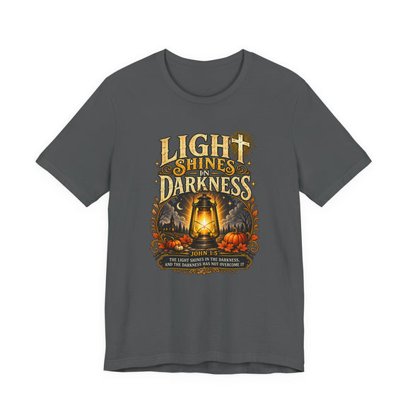 Light Shines in Darkness Tee — Christian Lantern Pumpkin Fall Halloween Shirt