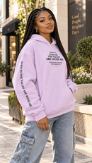 Black woman wearing Psalm 23:4 Christian hoodie with Fear No Evil sleeve print