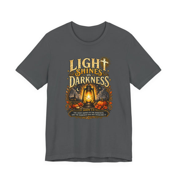 Light Shines in Darkness Tee — Christian Lantern Pumpkin Fall Halloween Shirt - Encore2woTeam PurpleS