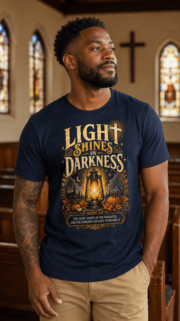 Light Shines in Darkness Tee — Christian Lantern Pumpkin Fall Halloween Shirt - Encore2woNavyS